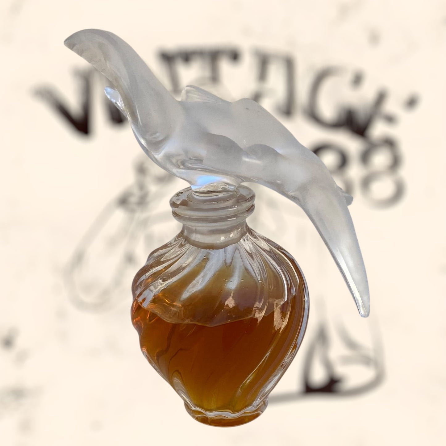Frasco de perfume L’ Air Temp de Nina Ricci diseñado por Marc Lalique antiguo