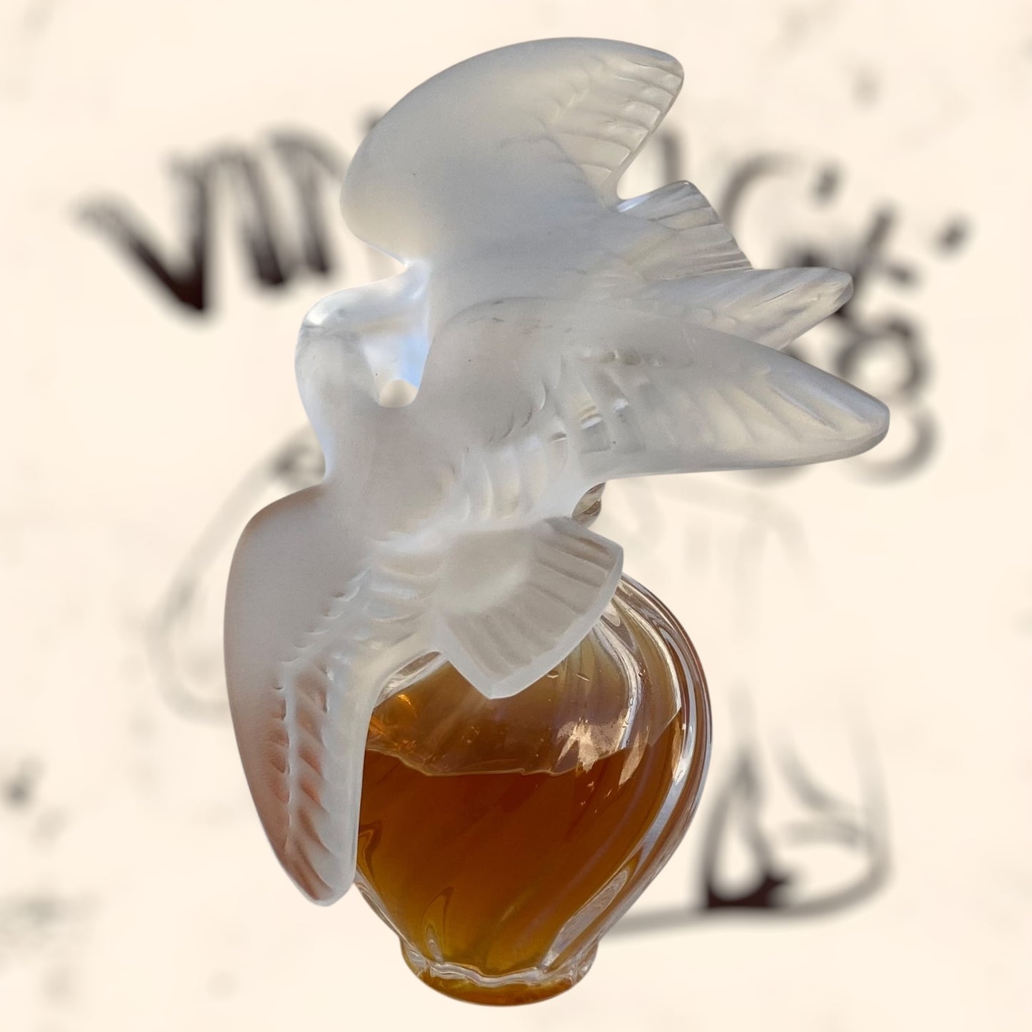 Frasco de perfume L’ Air Temp de Nina Ricci diseñado por Marc Lalique antiguo