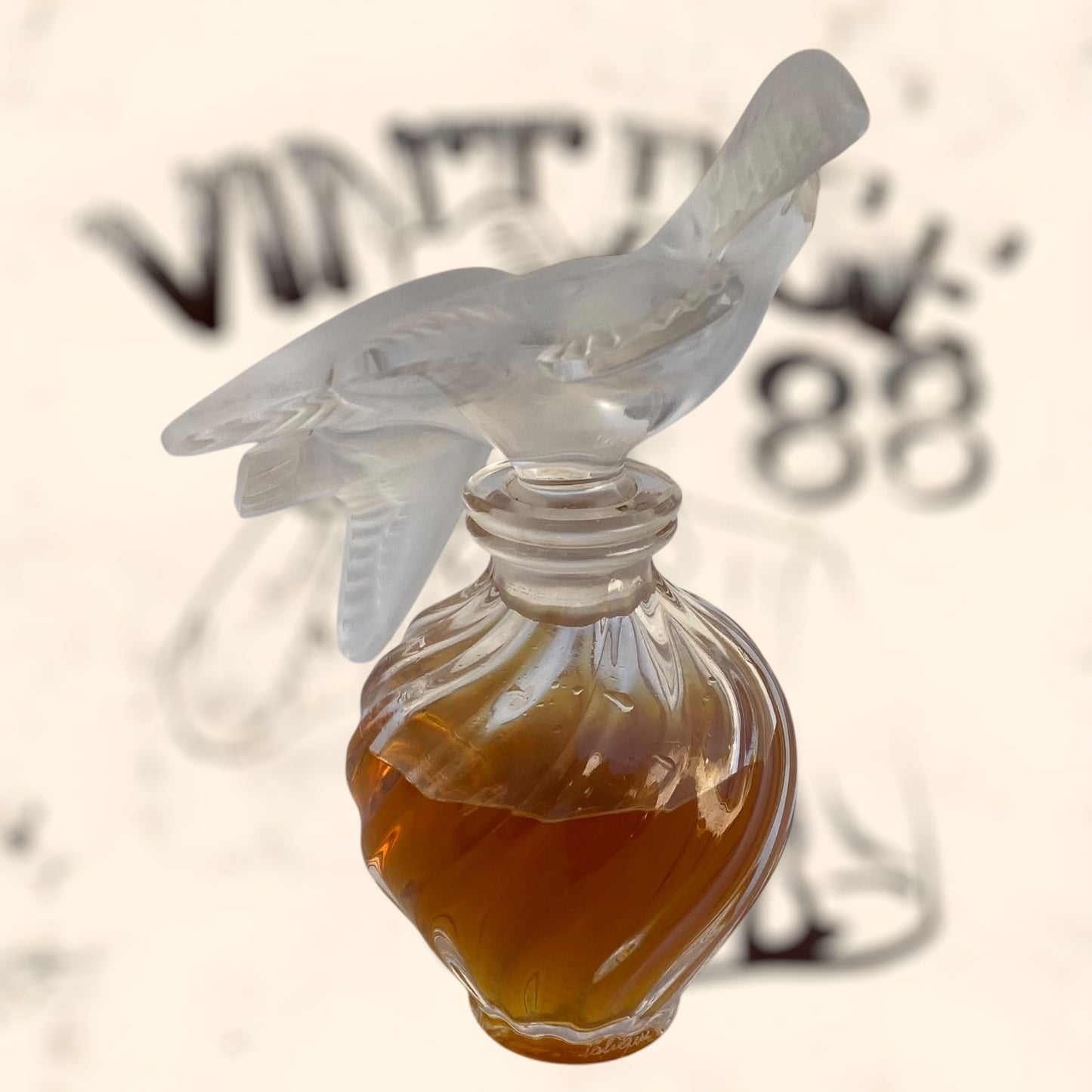 Frasco de perfume L’ Air Temp de Nina Ricci diseñado por Marc Lalique antiguo