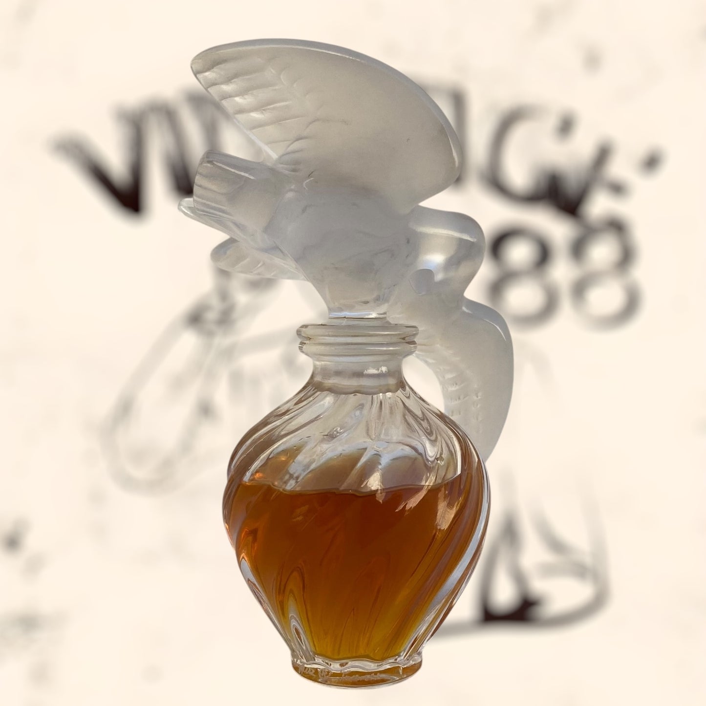 Frasco de perfume L’ Air Temp de Nina Ricci diseñado por Marc Lalique antiguo