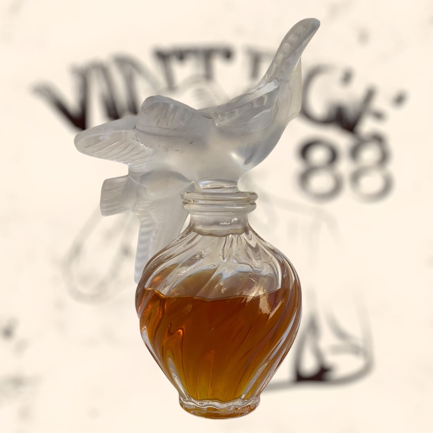 Frasco de perfume L’ Air Temp de Nina Ricci diseñado por Marc Lalique antiguo