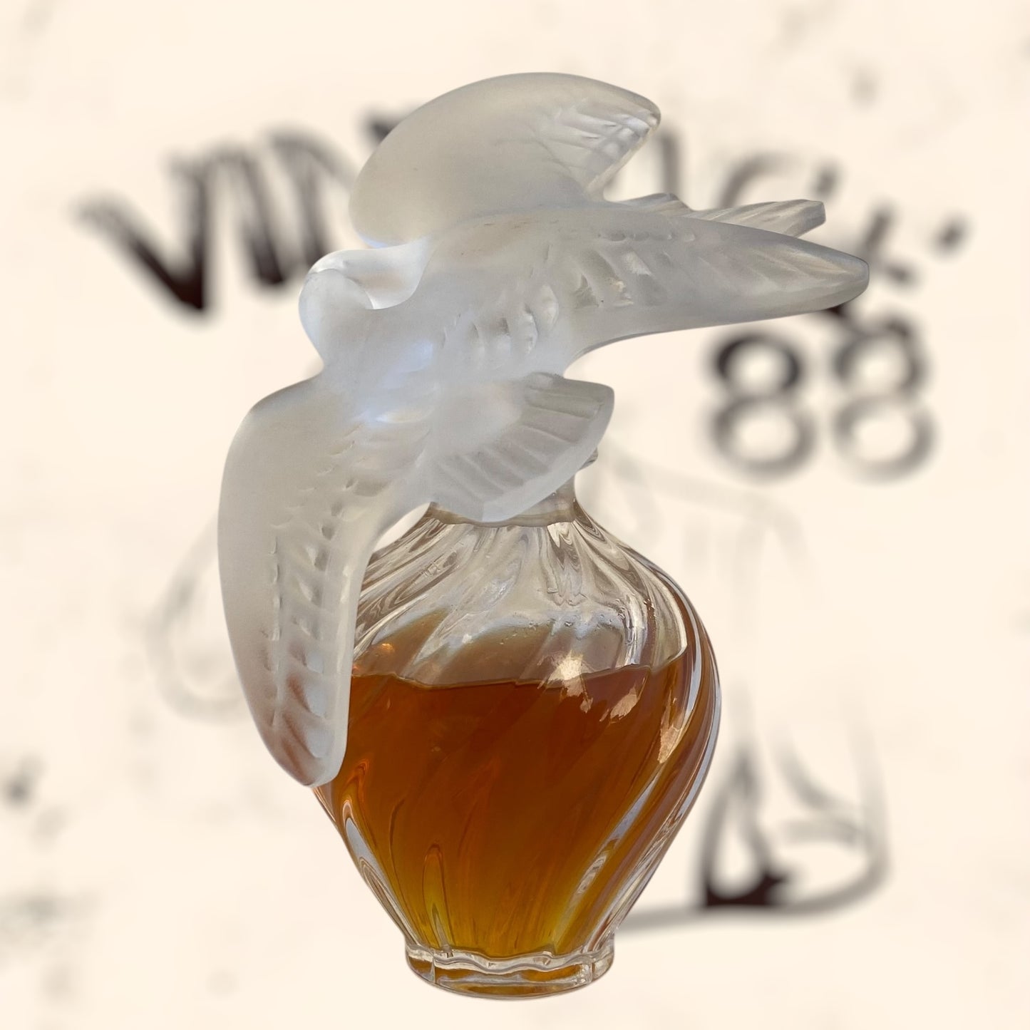 Frasco de perfume L’ Air Temp de Nina Ricci diseñado por Marc Lalique antiguo