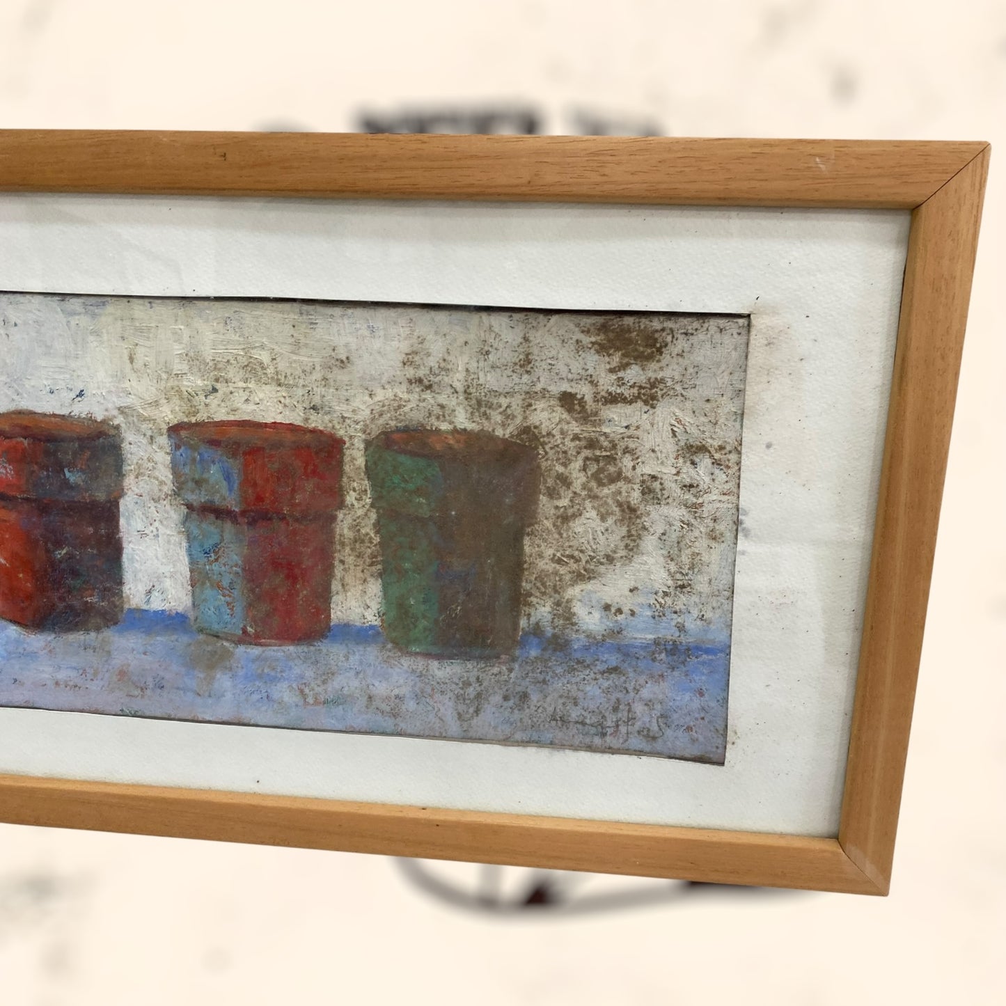 Pintura enmarcada y firmada
