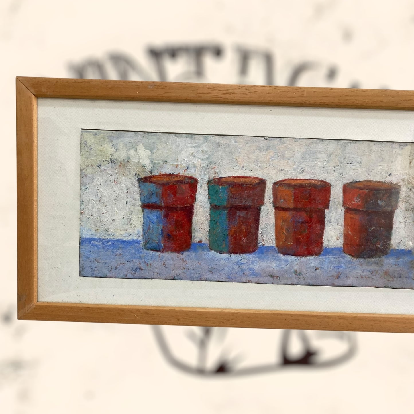 Pintura enmarcada y firmada